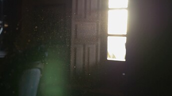 videoblocks-dust-floating-in-the-air-of-a-dark-room-with-an-open-window-and-sunglare_s3gmnduo6m_thumbnail-1080_02